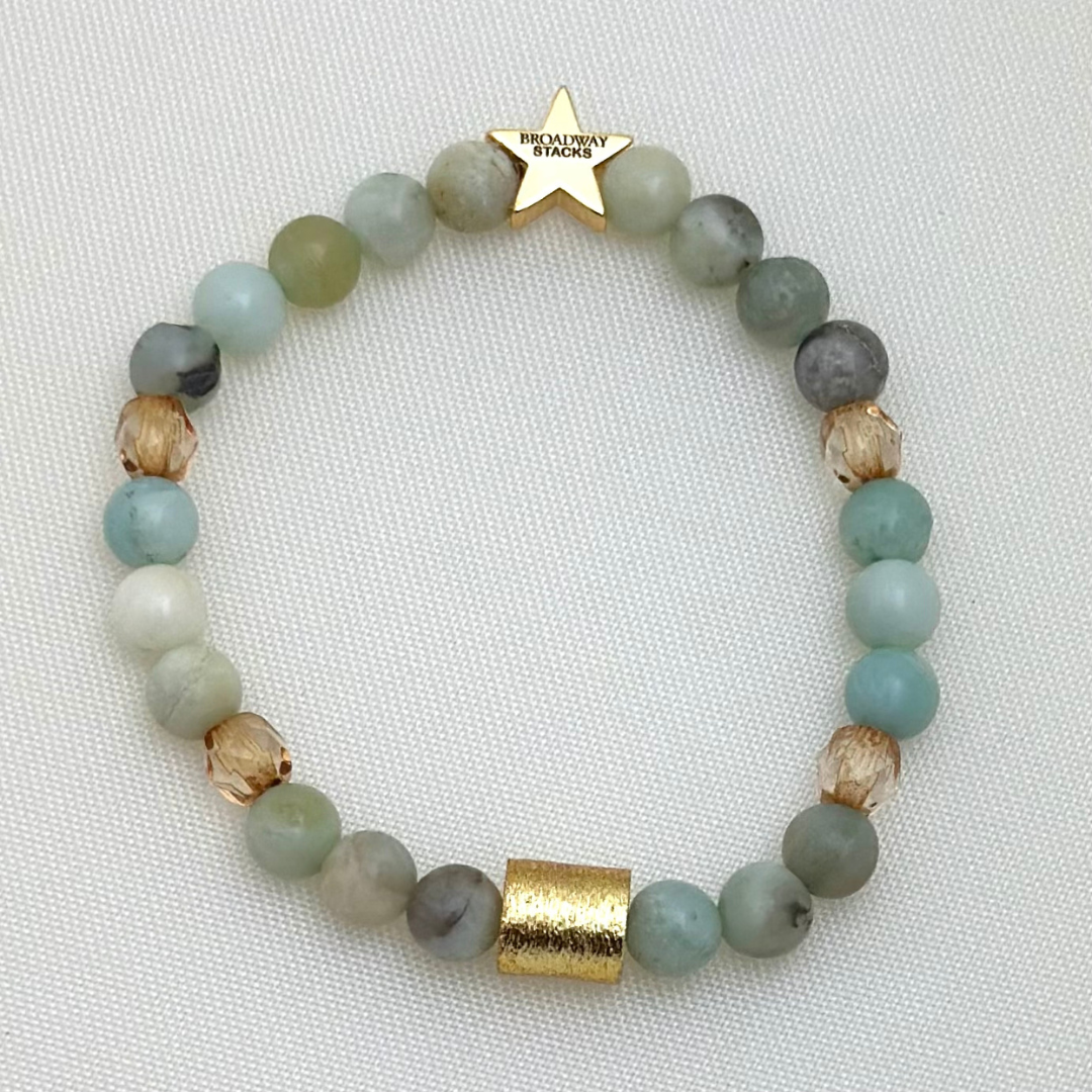 Broadway Stacks Motherlode Special Edition bracelets. Stretch bracelets. Greens, browns, white and gold colored beads. Letter beads that spell Motherlode, Boy Mom, Girl Mom, Twin Mom,