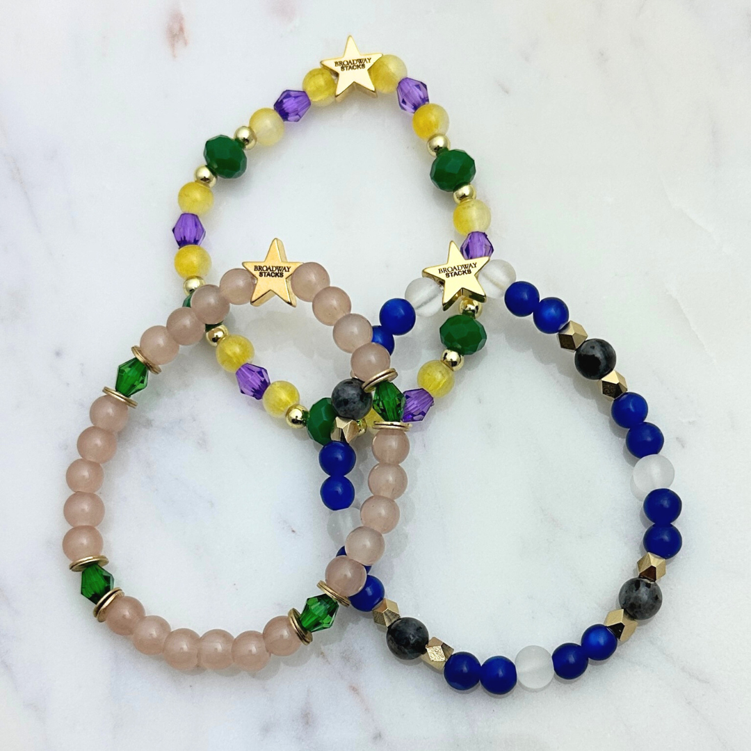 Broadway Stacks STAY GOLD collection. Stretch bracelets included in Stack. Inspired by characters from The Outsiders. Broadway Stacks gold star logo bead on back.