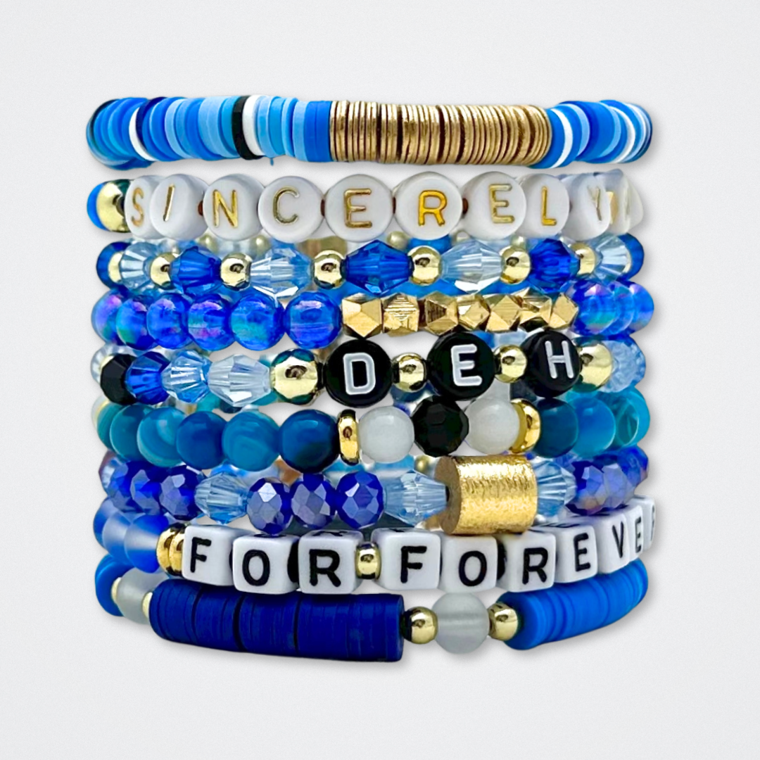 Broadway Stacks SKY collection. 3 stretch bracelets included in Stack. Blues, white, black and gold colored beads. Letter beads that spell quotes. Gold star logo bead to remind you that You Shine. Dear Evan Hansen DEH fans.