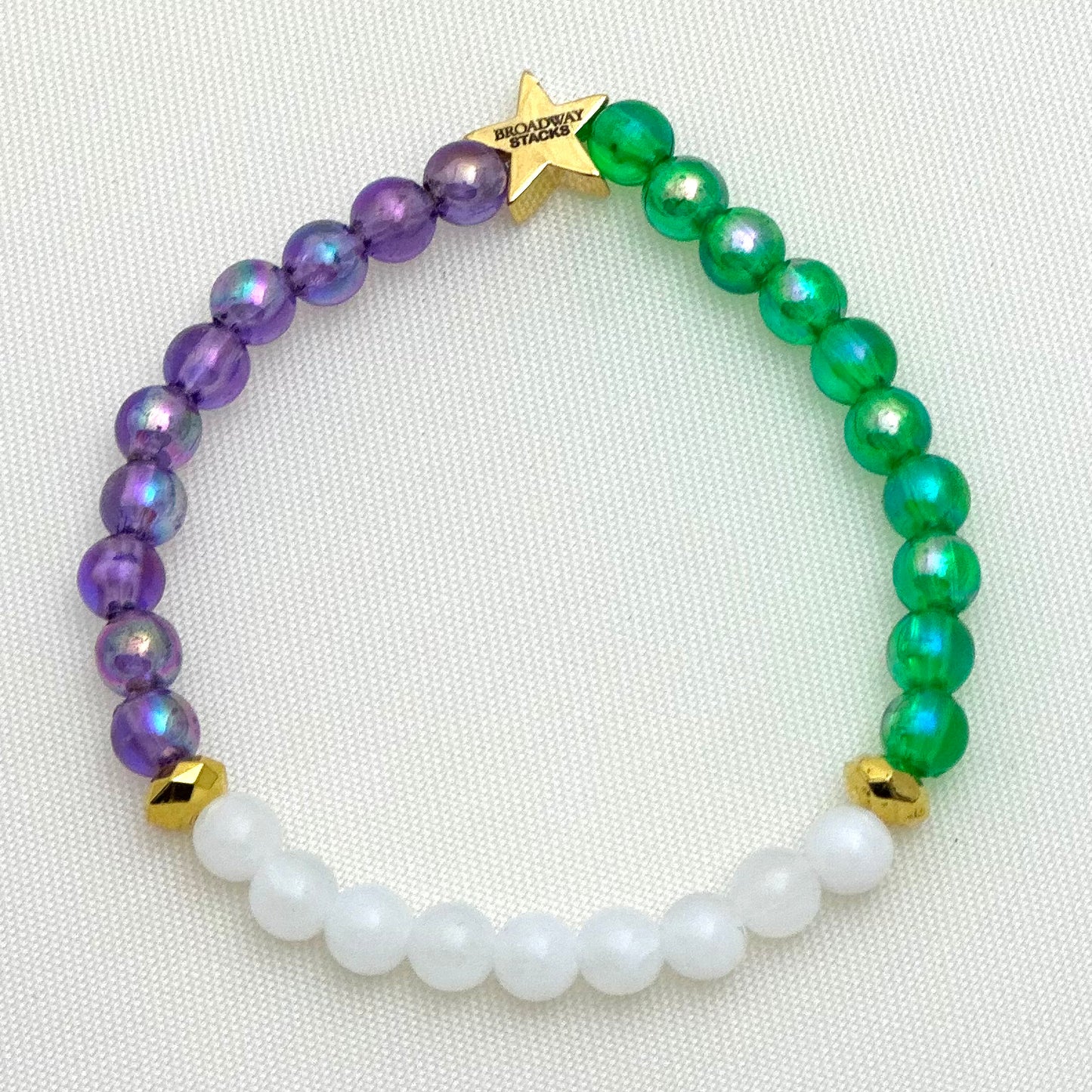 Broadway Stacks PRIDE collection. Avaliable in 8 designs. Red, orange, yellow, green, blue, purple, pink, white, grey, black and gold colored beads. Broadway Stacks gold star logo bead on back.