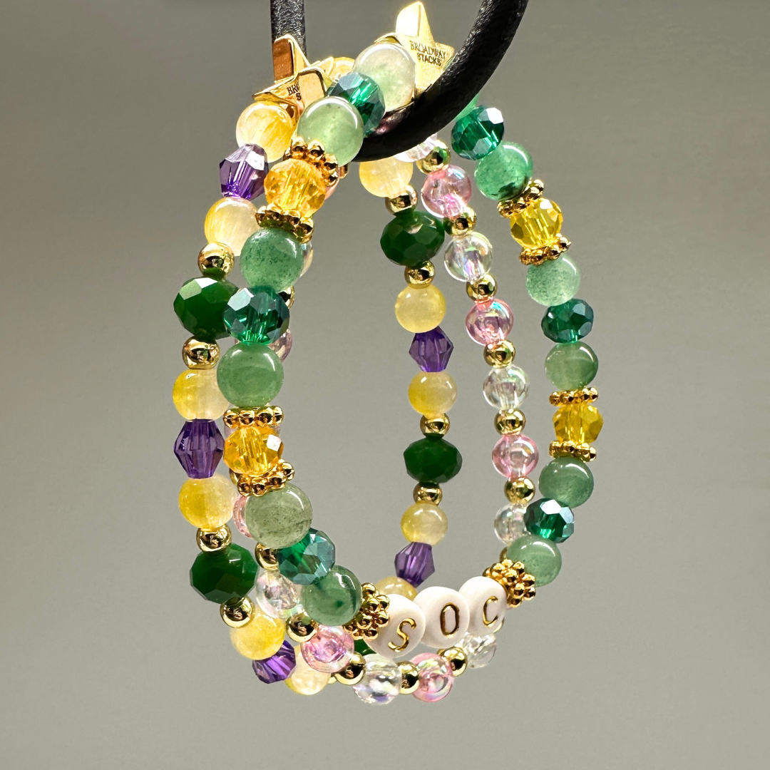 Broadway Stacks STAY GOLD collection. Stretch bracelets included in Stack. Inspired by characters from The Outsiders. Broadway Stacks gold star logo bead on back.