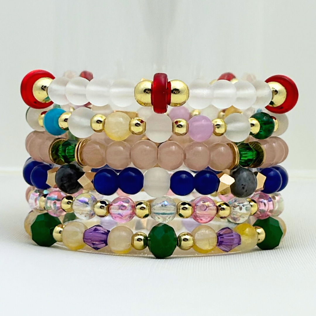 Broadway Stacks STAY GOLD collection. Stretch bracelets included in Stack. Inspired by characters from The Outsiders. Broadway Stacks gold star logo bead on back.