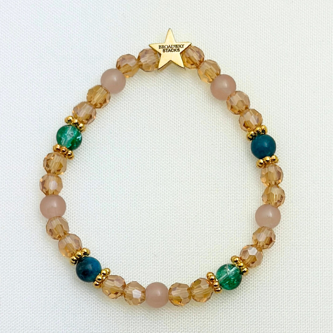 Broadway Stacks SAILOR Collection. 5 stretch bracelets included in Stack. Teal, green, blue and gold colored beads. Letter beads that spell quotes. Gold star logo bead to remind you that you shine.