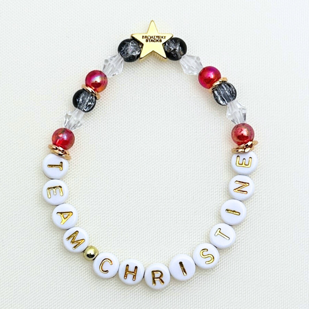 Broadway Stacks MASK collection. Team Phantom, Team Raoul, Team Christine letter bracelets. Stretch bracelet with red, black, gold and beads. Broadway Stacks gold star logo bead.