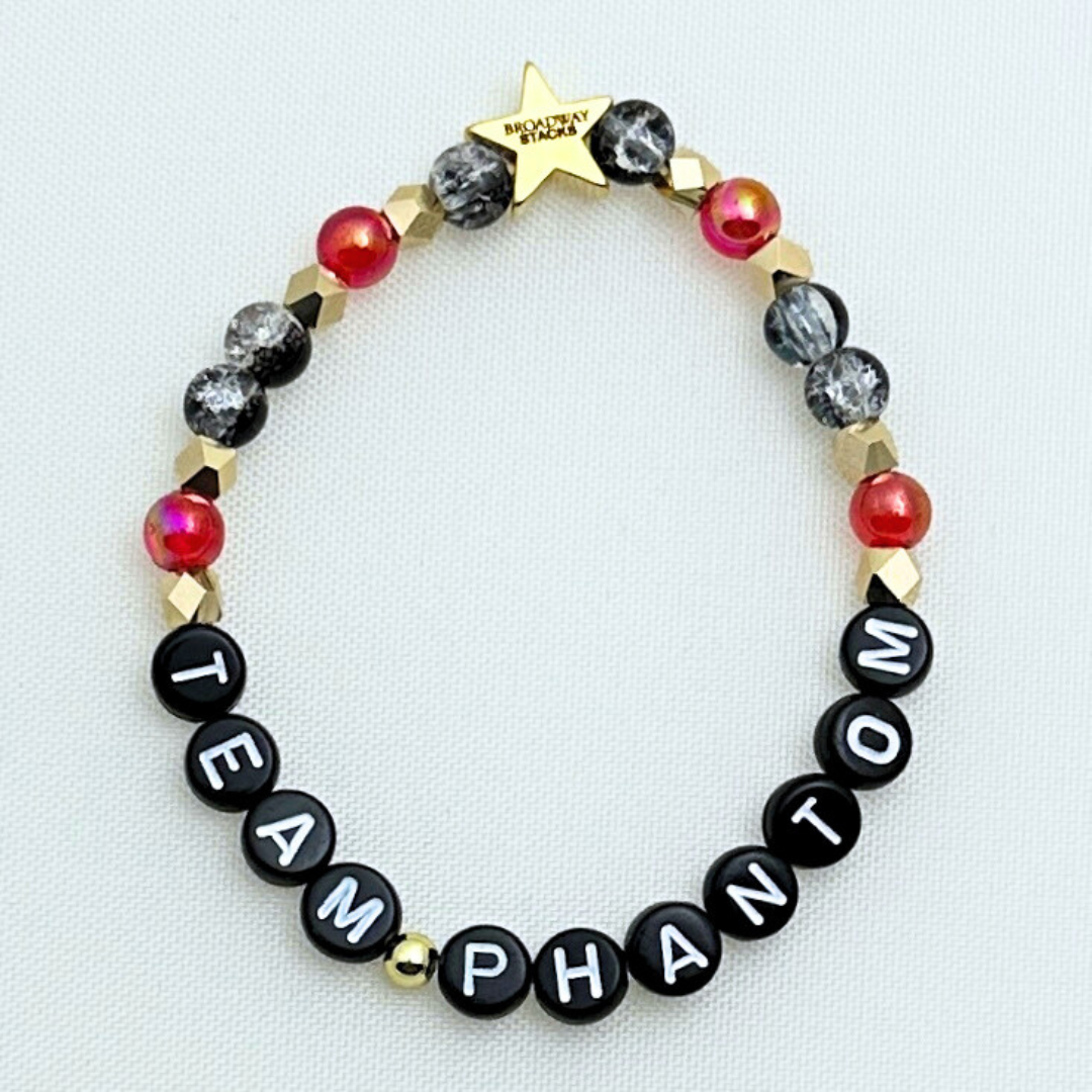 Broadway Stacks MASK collection. Team Phantom, Team Raoul, Team Christine letter bracelets. Stretch bracelet with red, black, gold and beads. Broadway Stacks gold star logo bead.