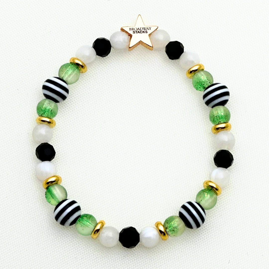 Broadway Stacks NETHERWORLD Collection. 5 stretch bracelets included in Stack. Green, black, purple, striped and gold colored beads. Letter beads that spell quotes. Gold star logo bead to remind you that you shine. Beetlejuice fans.