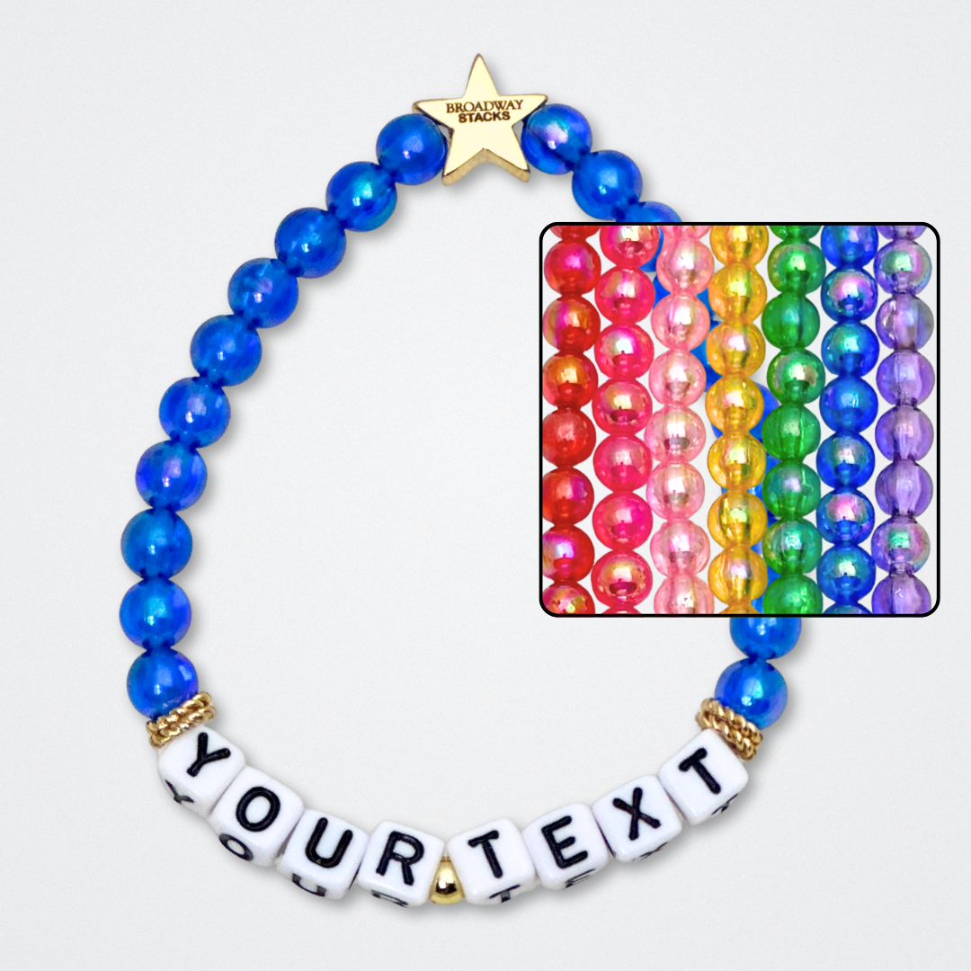 You create your own with CUSTOM text. Broadway Stacks rainbow colors elastic stretch bracelets with gold color accents. Gold star logo bead to remind you that You SHine. Available in red pink orange yellow green blue purple white black and mulit-color.