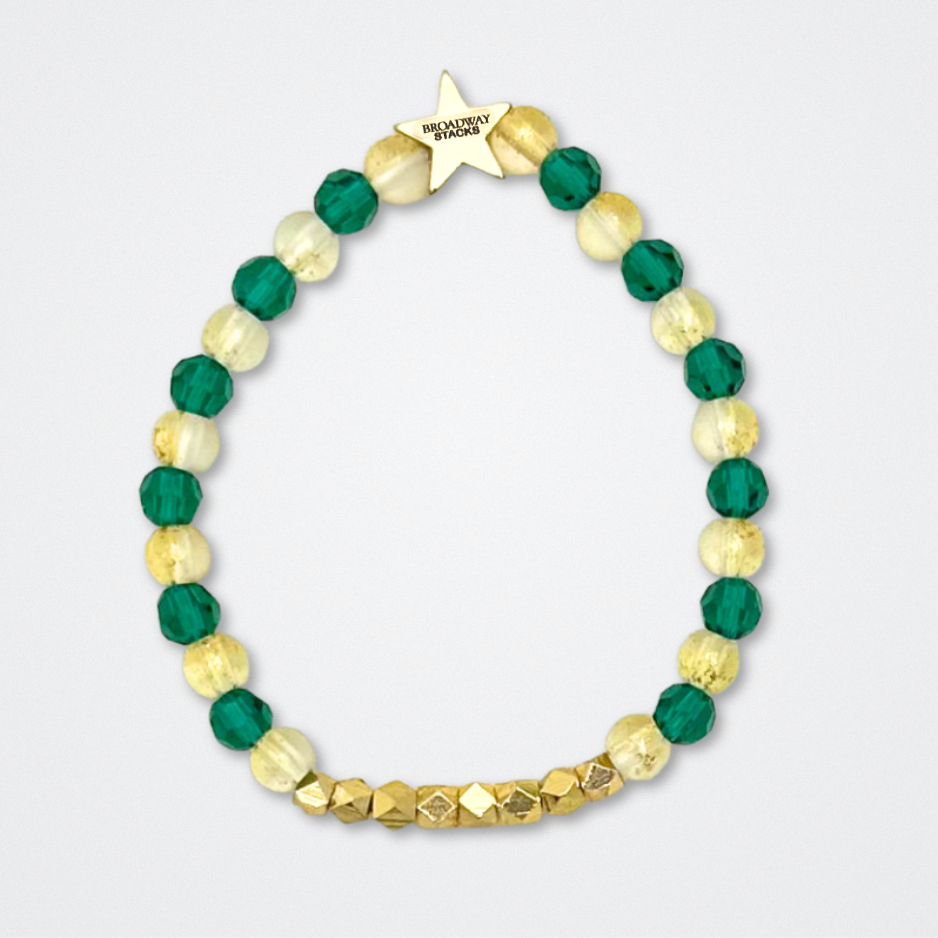 Broadway Stacks STAY GOLD collection. Stretch bracelets included in Stack. Gold, yellow, green and grey colored beads. Letter beads that have show quote or name. Broadway Stacks gold star logo bead to remind you that You Shine. The Outsiders the Musical fans.