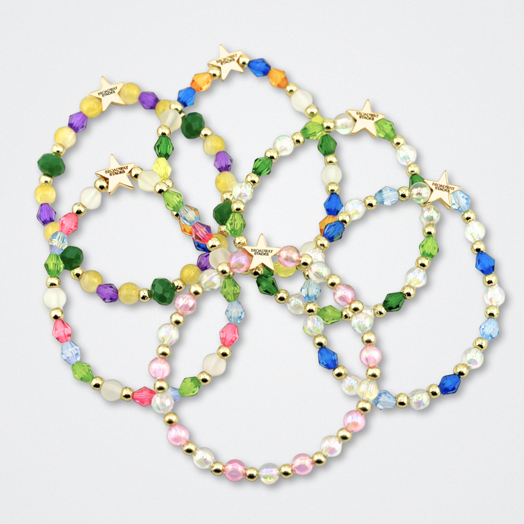 Broadway Stacks STAY GOLD collection. Stretch bracelets included in Stack. Inspired by characters from The Outsiders the Musical. Greasers and Socs. Broadway Stacks gold star logo bead to remind you that You Shine!