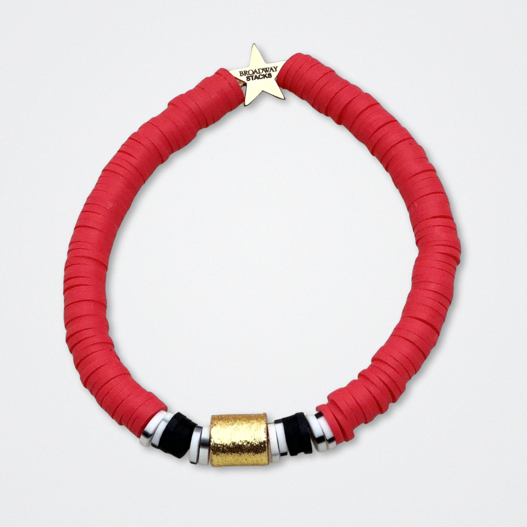 Broadway Stacks MASK collection. Bead bracelets included in Stack. Red, black, white and gold colored beads. Letter beads that spell quotes. Team Phantom, Team Christine, Team Raoul. Gold star logo bead to remind you that You Shine. Phantom of the Opera and Masquerade fans.