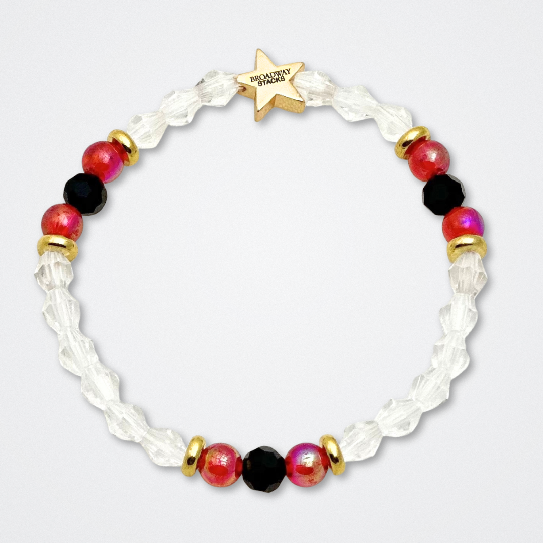 Broadway Stacks MASK collection. Bead bracelets included in Stack. Red, black, white and gold colored beads. Letter beads that spell quotes. Team Phantom, Team Christine, Team Raoul. Gold star logo bead to remind you that You Shine. Phantom of the Opera and Masquerade fans.