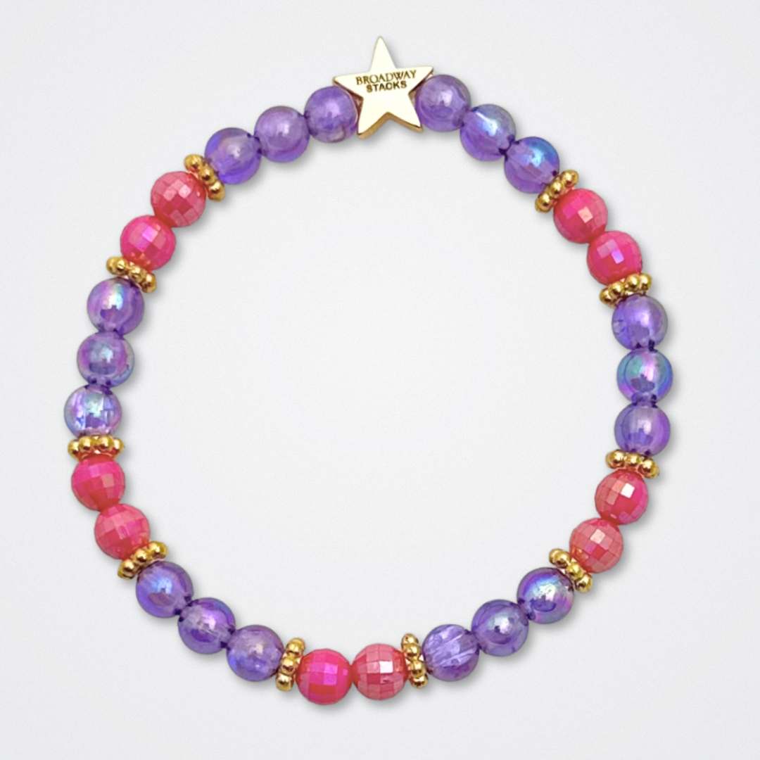 Broadway Stacks QUEEN collection. Stretch bracelets included in Stack. Gold, yellow, green, white, red, pink and blue colored beads. Letter beads that spell each queen. Also Herstory collection. Broadway Stacks gold star logo bead to remind you that You Shine. SIX the Musical fans.