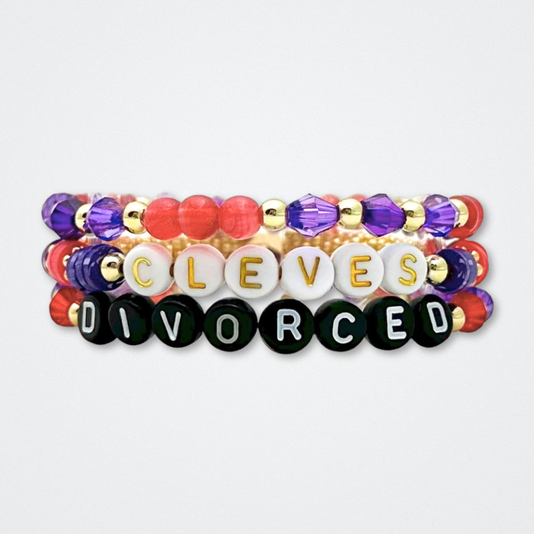 Broadway Stacks QUEEN collection. Stretch bracelets included in Stack. Gold, yellow, green, white, red, pink and blue colored beads. Letter beads that spell each queen. Also Herstory collection. Broadway Stacks gold star logo bead to remind you that You Shine. SIX the Musical fans.