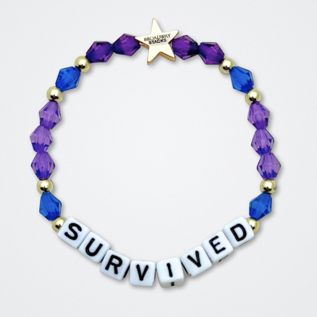 Broadway Stacks QUEEN collection. Stretch bracelets included in Stack. Gold, yellow, green, white, red, pink and blue colored beads. Letter beads that spell each queen. Also Herstory collection. Broadway Stacks gold star logo bead to remind you that You Shine. SIX the Musical fans.