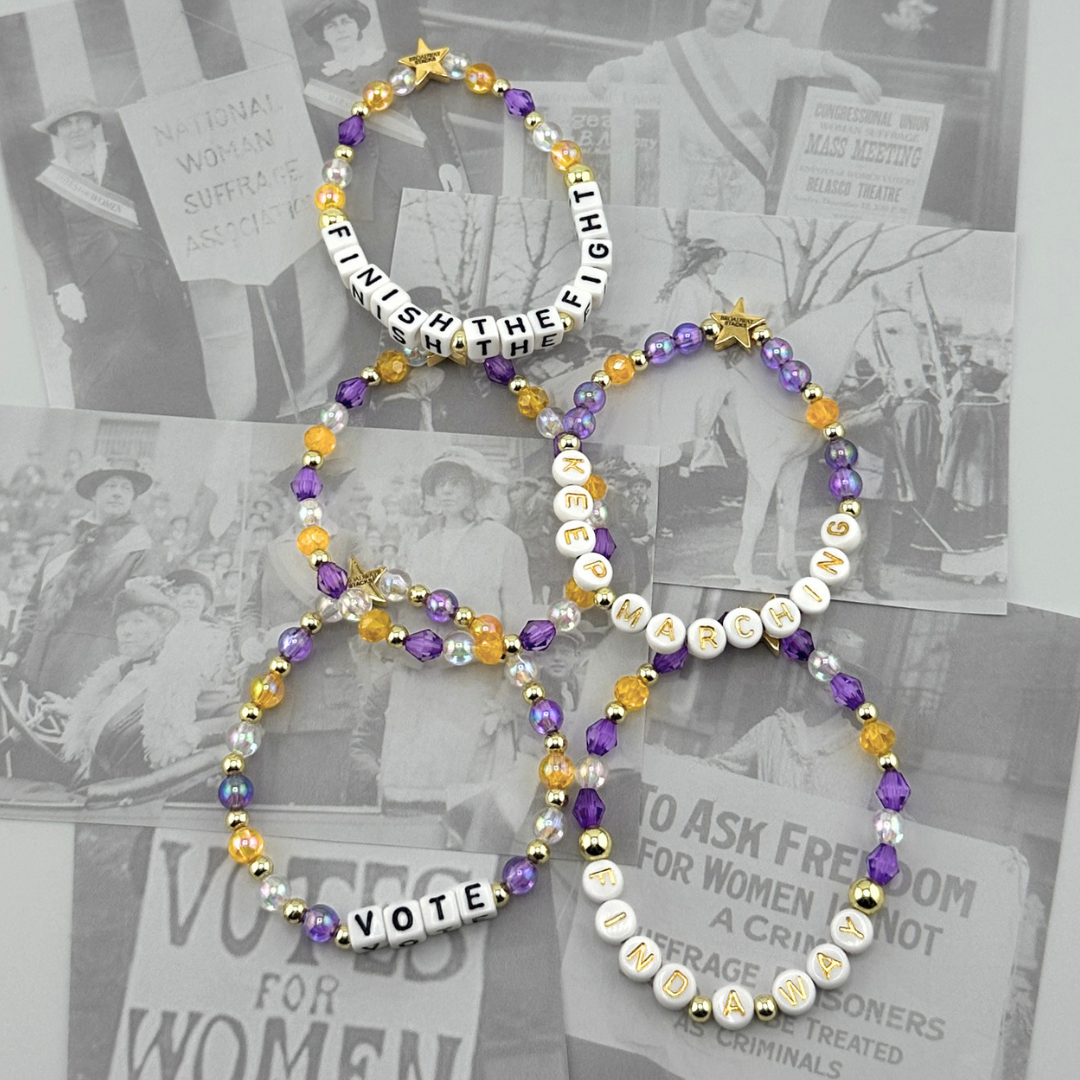 Five bracelets on a background of Suffragist photos. Broadway Stacks CAMPAIGN Collection. Purple, yellow, clear and gold colored beads. Gold star logo bead to remind you that you shine. Inspired by Suffs the Musical.