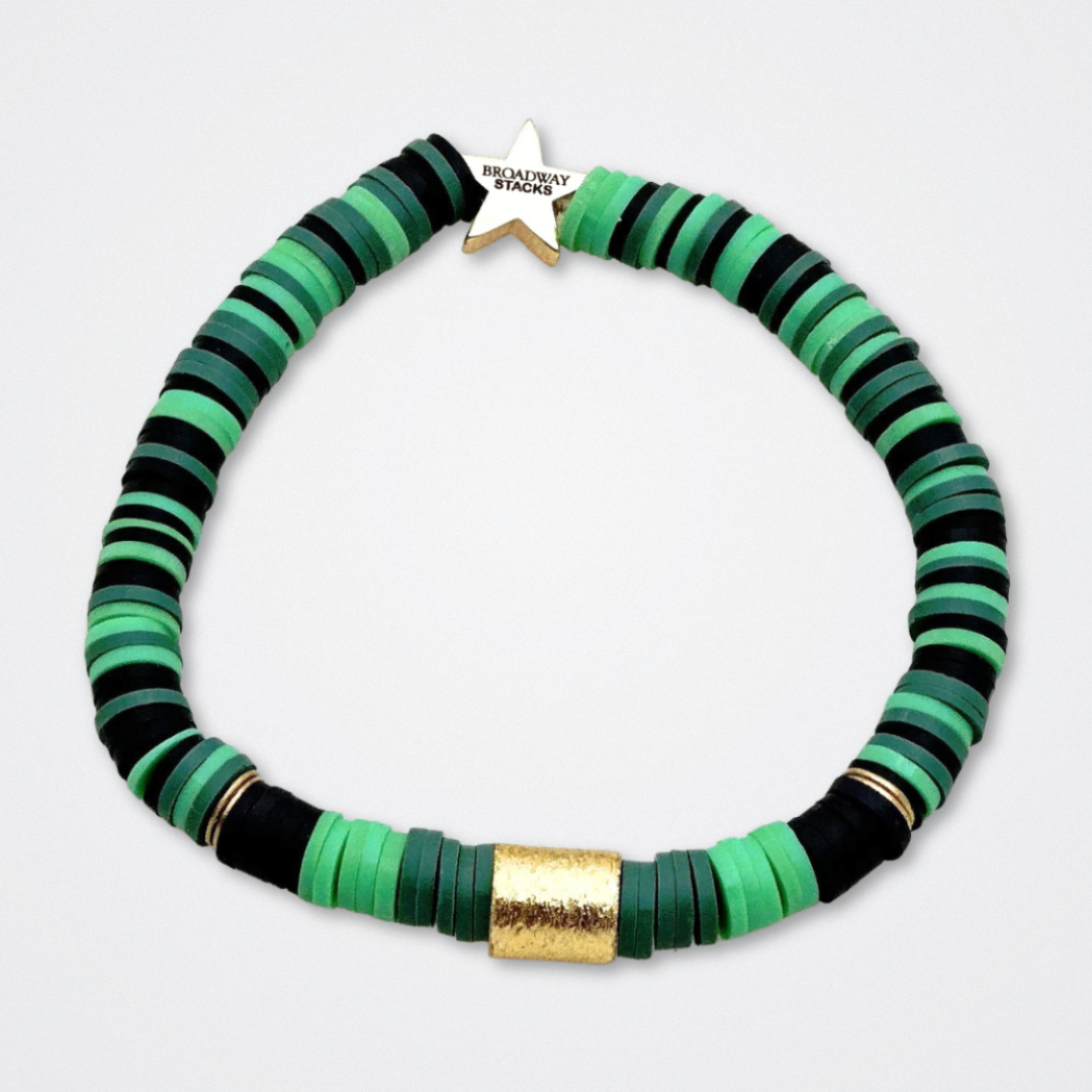 Broadway Stacks WITCH collection. 3 stretch bracelets included in Stack. Greens, pinks, black and gold colored beads. Letter beads that spell quotes. Gold star logo bead to remind you that You Shine. Wicked fans.