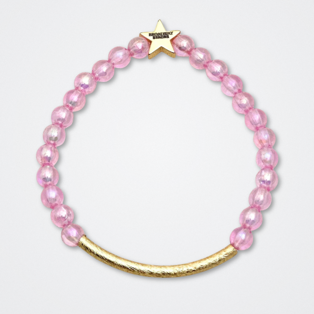 Broadway Stacks WITCH collection. 3 stretch bracelets included in Stack. Greens, pinks, black and gold colored beads. Letter beads that spell quotes. Gold star logo bead to remind you that You Shine. Wicked fans.