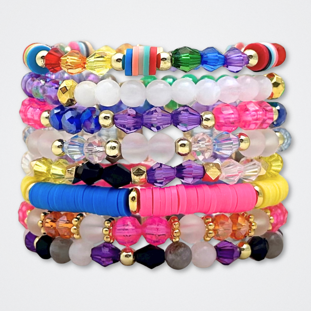 Broadway Stacks PRIDE collection. Available in 8 designs. Rainbow - Red, orange, yellow, green, blue, purple, pink, white, grey, black and gold colored beads. Broadway Stacks gold star logo bead to remind you that You Shine.
