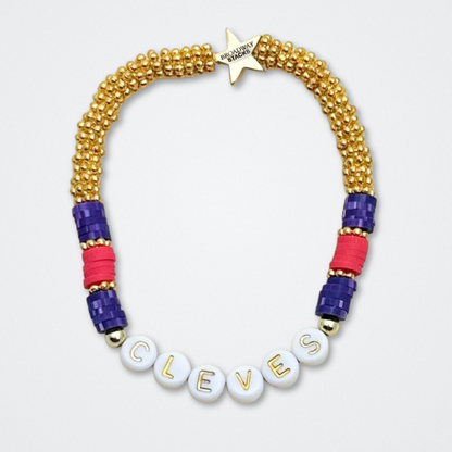 Broadway Stacks QUEEN collection. Stretch bracelets included in Stack. Gold, yellow, green, white, red, pink and blue colored beads. Letter beads that spell each queen. Also Herstory collection. Broadway Stacks gold star logo bead to remind you that You Shine. SIX the Musical fans.