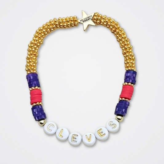 Broadway Stacks QUEEN collection. Stretch bracelets included in Stack. Gold, yellow, green, white, red, pink and blue colored beads. Letter beads that spell each queen. Also Herstory collection. Broadway Stacks gold star logo bead to remind you that You Shine. SIX the Musical fans.