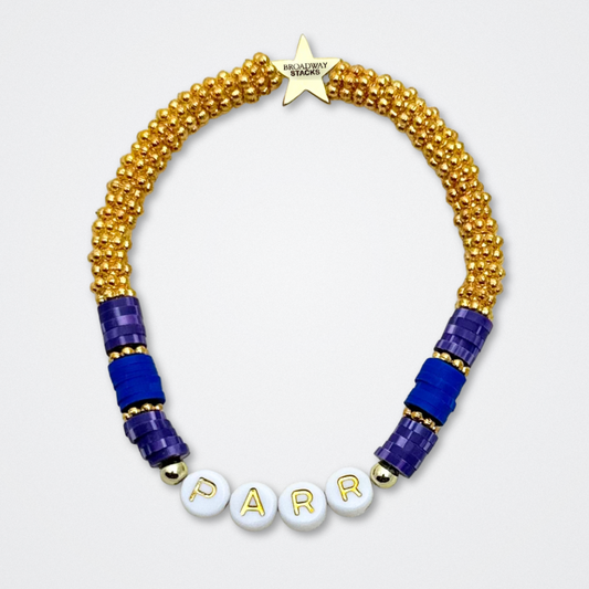 Broadway Stacks QUEEN collection. Stretch bracelets included in Stack. Gold, yellow, green, white, red, pink and blue colored beads. Letter beads that spell each queen. Also Herstory collection. Broadway Stacks gold star logo bead to remind you that You Shine. SIX the Musical fans.
