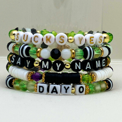 Beetlejuice themed bracelets, gold accents, gold star logo bead