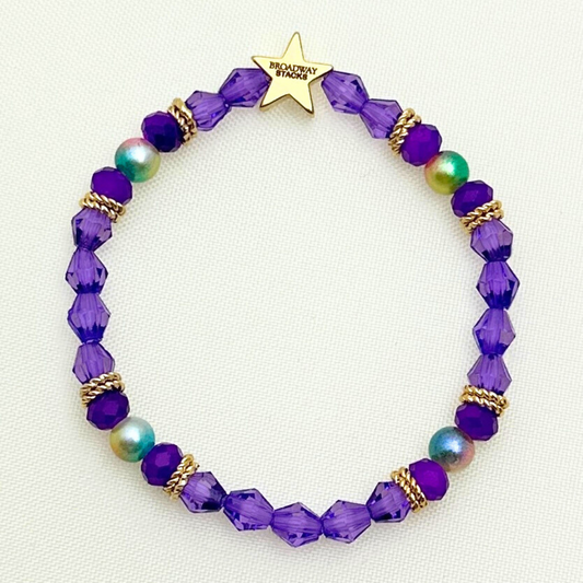 Broadway Stacks BroadwayCon X 2025 Broadway Lover bracelet. Purple, gold and iridescent colored beads. 