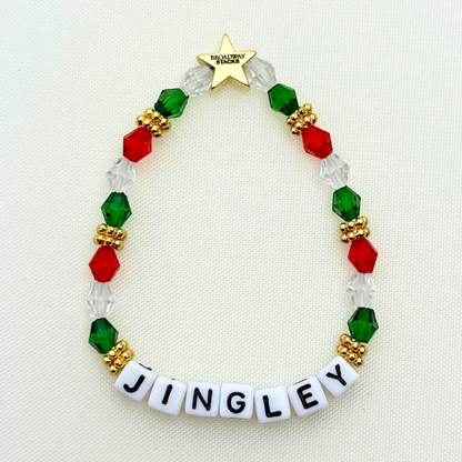 Broadway Stacks CHRISTMAS Collection. 4 stretch bracelets included in Stack. Red, green, white and gold colored beads. Letter beads that spell quotes. Gold star logo bead to remind you that you shine.