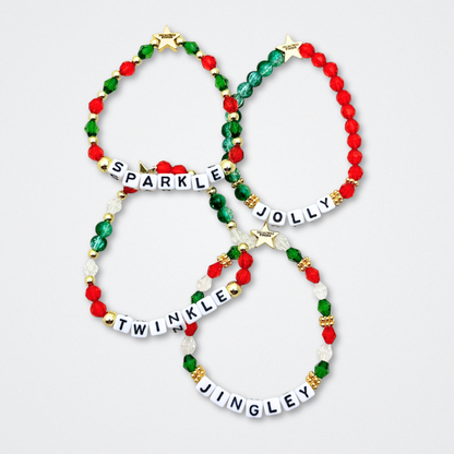 Broadway Stacks CHRISTMAS ELF Collection. Coordinating bead bracelets included in Stack. Red, green, white and gold colored beads. Letter beads that spell quotes. Gold star logo bead to remind you that you shine. Elf the Musical and Christmas holiday fans.