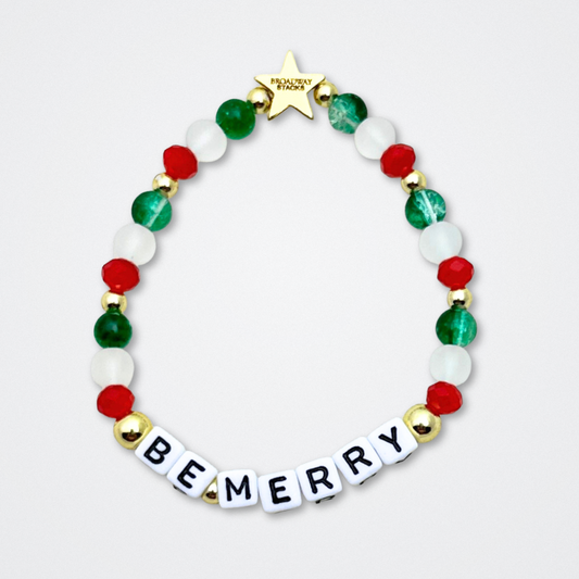 Broadway Stacks CHRISTMAS ELF Collection. Coordinating bead bracelets included in Stack. Red, green, white and gold colored beads. Letter beads that spell quotes. Gold star logo bead to remind you that you shine. Elf the Musical and Christmas holiday fans.
