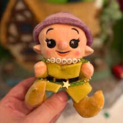 Broadway Stacks Special Edition bracelet. Green, yellow, purple and gold beads. Letter beads that spell Dopey. A portion of the proceeds go to Gilana's Fund. Gold star logo bead to remind you that you shine.