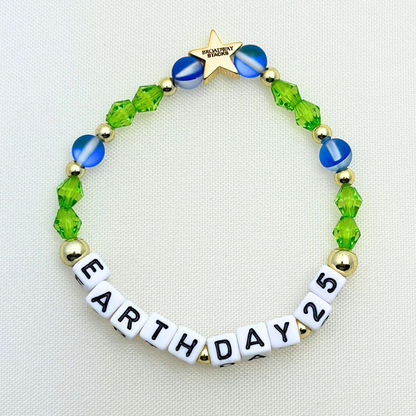 Earth Day 2025 Special Edition bracelet. Stack of 3 bracelets. Green, blue, white and gold beads. Letter beads that spell Earth Day 25 and Active Hope. Gold star logo bead to remind you that you shine.