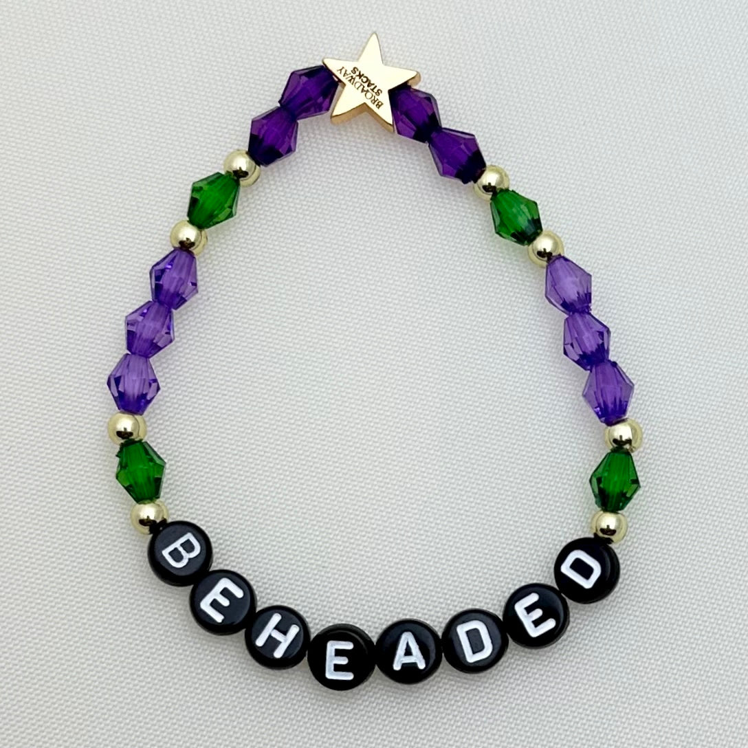 Broadway Stacks QUEEN collection. Stretch bracelets included in Stack. Gold, yellow, green, white, red, pink and blue colored beads. Letter beads that spell each queen. Also Herstory collection. Broadway Stacks gold star logo bead on back.