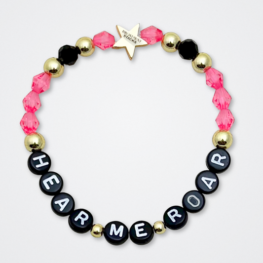 Broadway Stacks De Bois Band collection. 3 stretch bracelets included in Stack. Pinks, golds and black colored beads. Letter beads that spell quotes. Broadway Stacks gold star logo bead to remind you that you shine. & Juliet fans.