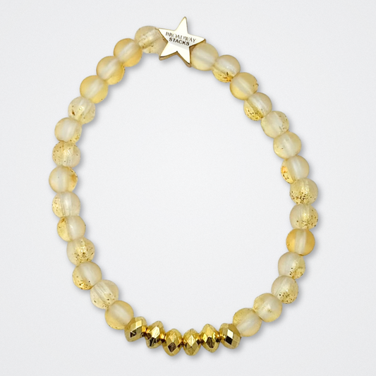 Broadway Stacks De Bois Band collection. 3 stretch bracelets included in Stack. Pinks, golds and black colored beads. Letter beads that spell quotes. Broadway Stacks gold star logo bead to remind you that you shine. & Juliet fans.