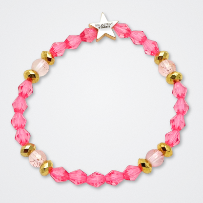 Broadway Stacks KEEP IT POSITIVE Collection. 9 stretch bracelets included in Stack. Pinks, white and gold colored beads. Letter beads that spell quotes. Gold star logo bead to remind you that you shine. Legally Blonde fans. 