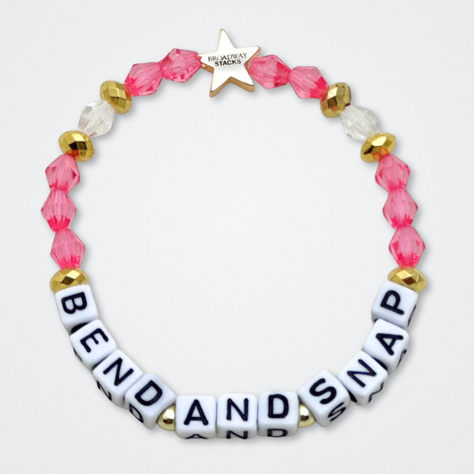 Broadway Stacks KEEP IT POSITIVE Collection. 9 stretch bracelets included in Stack. Pinks, white and gold colored beads. Letter beads that spell quotes. Gold star logo bead to remind you that you shine. Legally Blonde fans. 