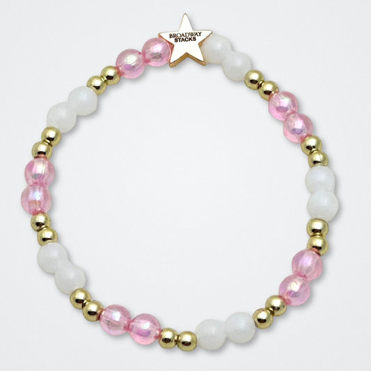 Broadway Stacks KEEP IT POSITIVE Collection. 9 stretch bracelets included in Stack. Pinks, white and gold colored beads. Letter beads that spell quotes. Gold star logo bead to remind you that you shine. Legally Blonde fans. 