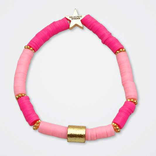 Broadway Stacks KEEP IT POSITIVE Collection. 9 stretch bracelets included in Stack. Pinks, white and gold colored beads. Letter beads that spell quotes. Gold star logo bead to remind you that you shine. Legally Blonde fans. 