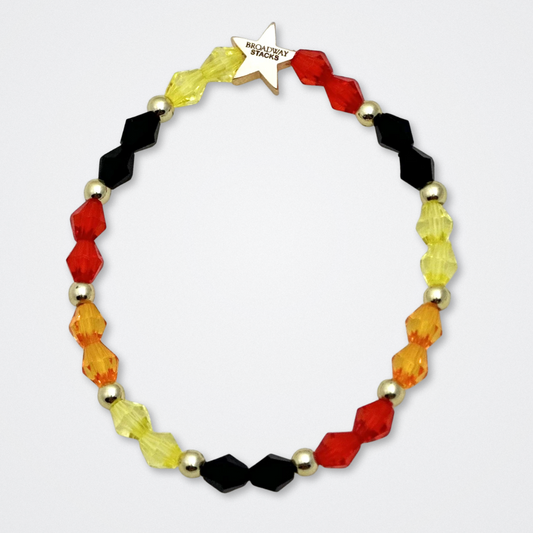 Broadway Stacks SAFARI collection. 3 stretch bracelets included in Stack. Dark reds, yellow, orange, white, black and gold colored beads. Animal print beads as well. Letter beads that spell quotes, Gold star logo bead to remind you that you shine.