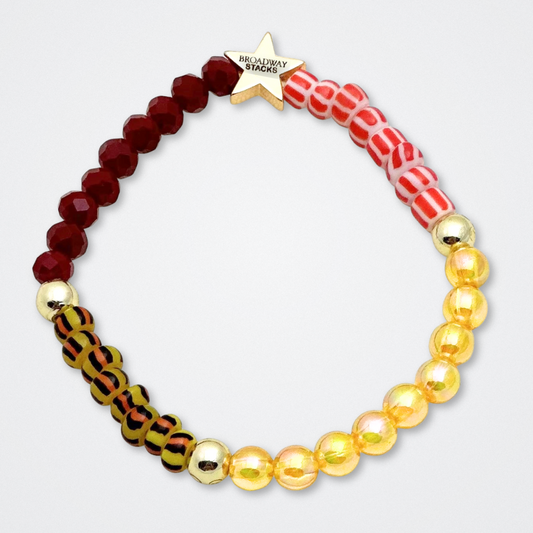 Broadway Stacks SAFARI collection. 3 stretch bracelets included in Stack. Dark reds, yellow, orange, white, black and gold colored beads. Animal print beads as well. Letter beads that spell quotes, Gold star logo bead to remind you that you shine.