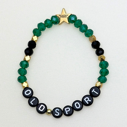 Broadway Stacks NEW MONEY Collection. 5 stretch bracelets included in Stack. Teal, black and gold colored beads. Letter beads that spell quotes. Gold star logo bead to remind you that you shine.