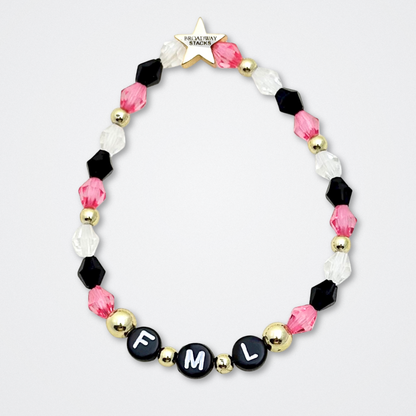 Broadway Stacks POTUS collection. 3 stretch bracelets included in Stack. Pinks, white, blue, golds and black colored beads. Letter beads that spell show quotes. Broadway Stacks gold star logo bead to remind you that You Shine. POTUS play fans.