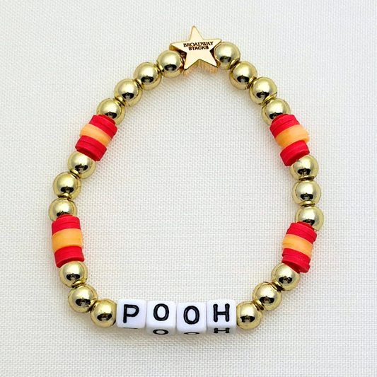 Broadway Stacks HONEY Collection. 3 stretch bracelets included in Stack. Red, yellow and gold colored beads. Letter beads that spell quotes. Gold star logo bead to remind you that you shine.