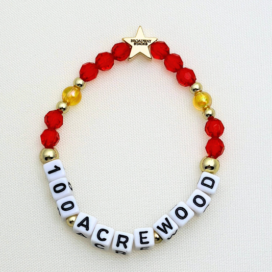 Broadway Stacks HONEY Collection. 3 stretch bracelets included in Stack. Red, yellow and gold colored beads. Letter beads that spell quotes. Gold star logo bead to remind you that you shine.