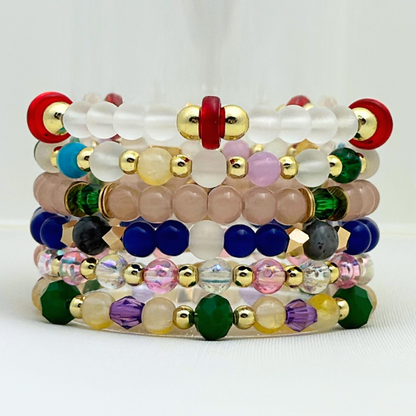Broadway Stacks STAY GOLD collection. Stretch bracelets included in Stack. Inspired by characters from The Outsiders. Broadway Stacks gold star logo bead on back.
