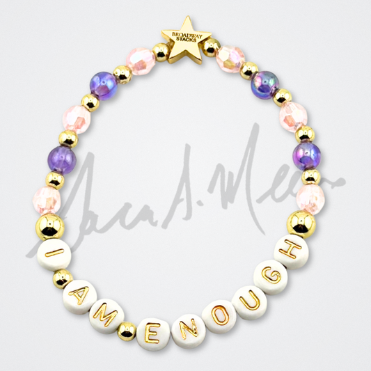 Broadway Stacks Special Edition Sara Mearns STAGE Bracelet Collection. 5 stretch bracelets included in Stack. Purple, pink, clear, white, glitter and gold colored beads. Letter beads that spell quotes. Gold star logo bead to remind you that you shine. Sara Mearns and Ballet fans.