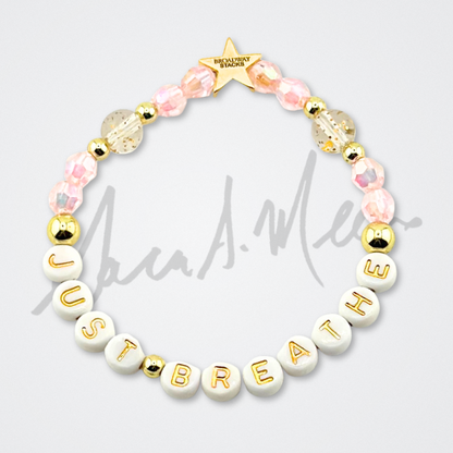 Broadway Stacks Special Edition Sara Mearns STAGE Bracelet Collection. 5 stretch bracelets included in Stack. Purple, pink, clear, white, glitter and gold colored beads. Letter beads that spell quotes. Gold star logo bead to remind you that you shine. Sara Mearns and Ballet fans.
