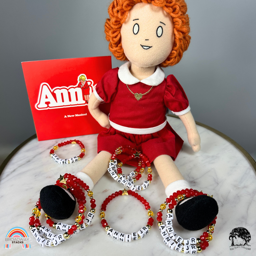 Town Theatre - Annie Jr Limited Edition Bracelet Fundraiser. 1 stretch bracelet. Red, yellow and gold colored beads. Letter beads that spell Annie Jr.