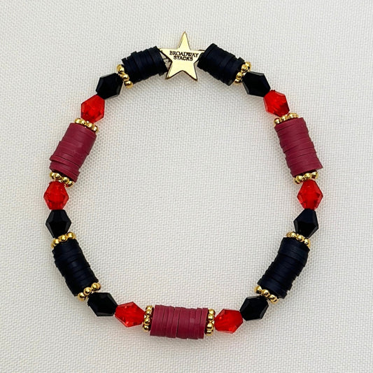 Broadway Stacks Underworld collection. 5 stretch bracelets included in Stack. Red, garnet, black and gold colored beads. Letter beads that spell quotes. Gold star logo bead to remind you that you shine.